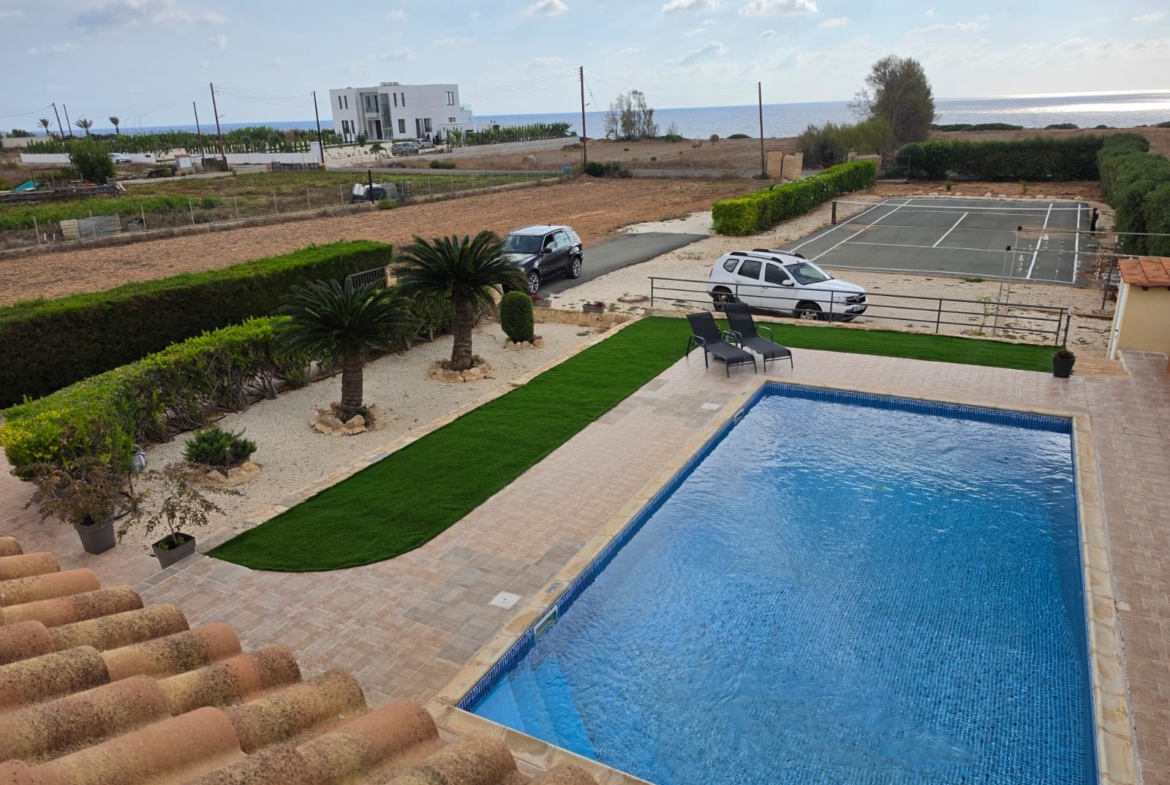 Four Bedroom villa with a swimming pool by the coast line Ref. SUN1591